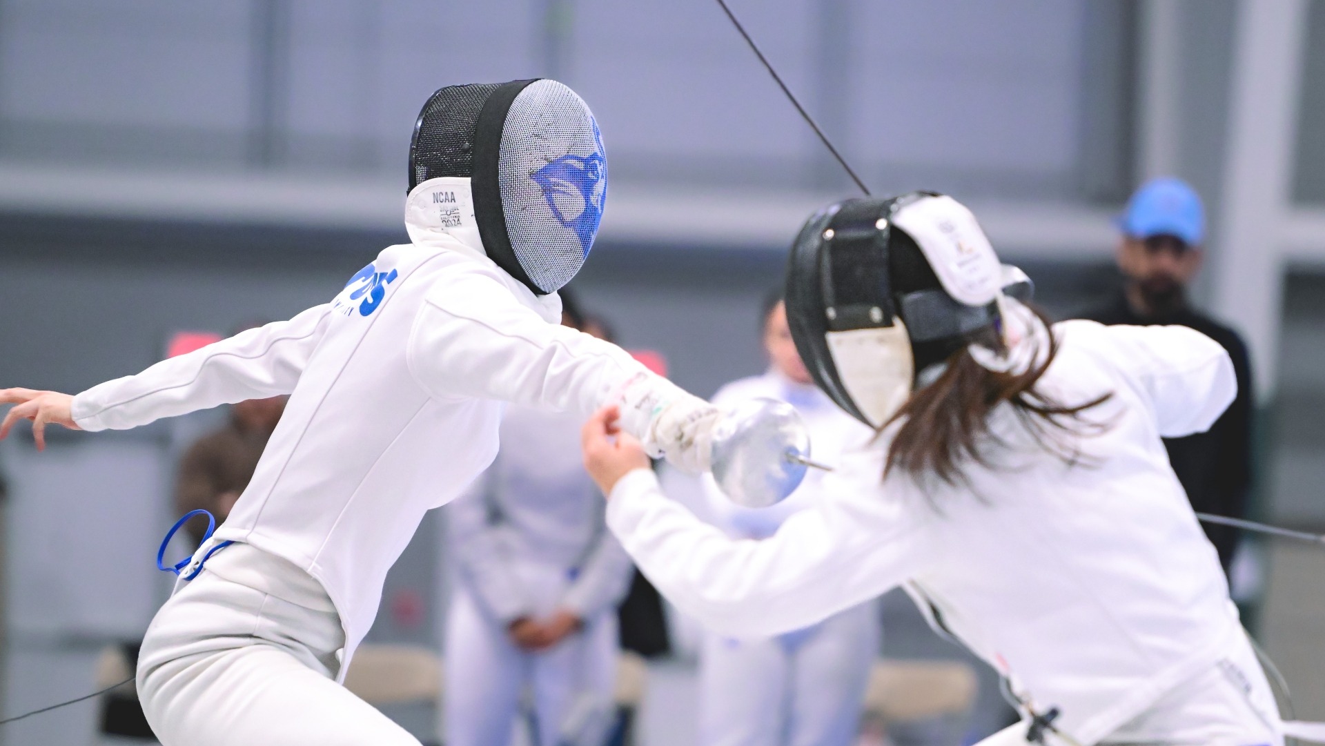 Karen Bei fences at the Tufts Invitational in January 2024.