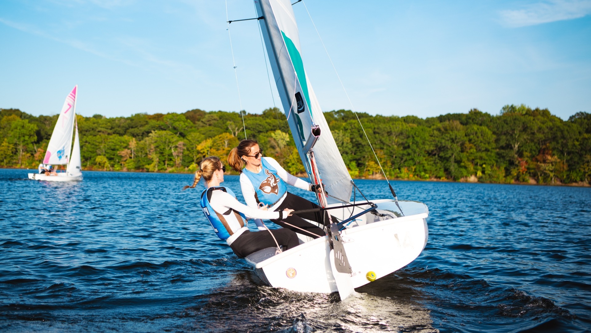Maddie Janzen and Lilly Ladd work together at practice.