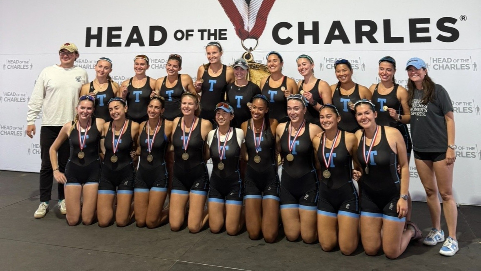 Tufts Women's Rowing 1st two eights on the podium at the Head of the Charles.