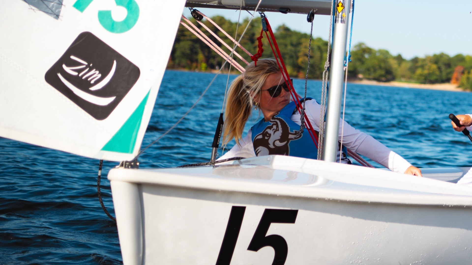 Reddin Kehrli crews at Tufts Sailing practice on Upper Mystic Lake.