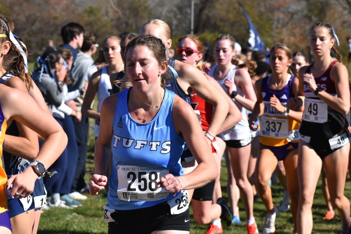 Liz Donahue runs at the front of the pack at the NESCAC meet.