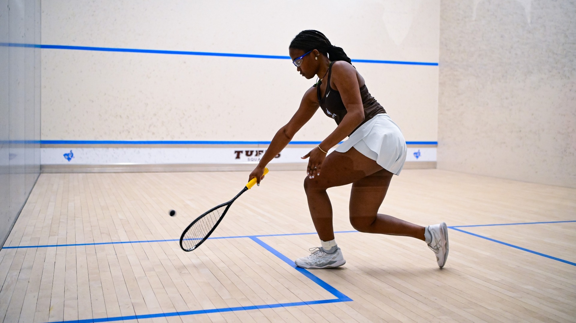 Indira Moshi makes a shot in her match against Dartmouth College.