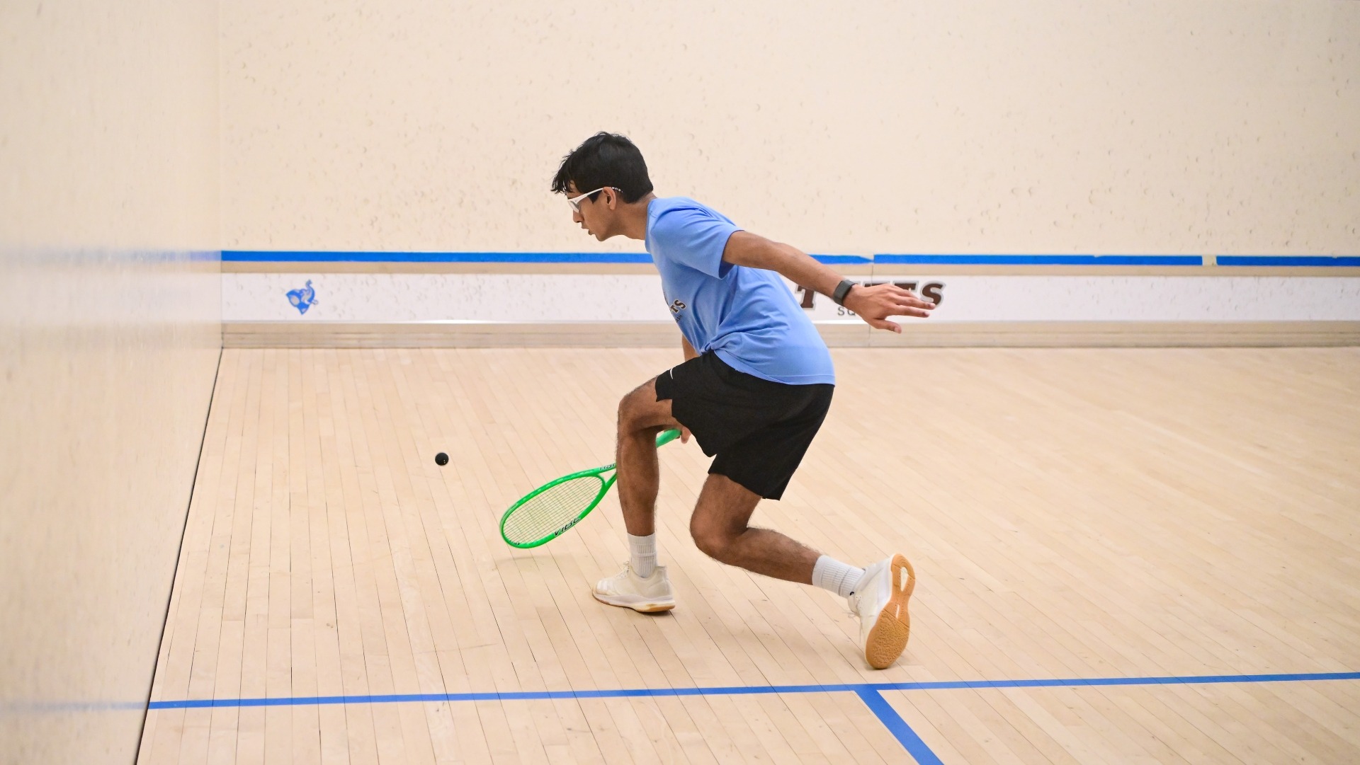 Shivin Kumar makes a shot against Western (Ont.) University at Tufts Squash Center.