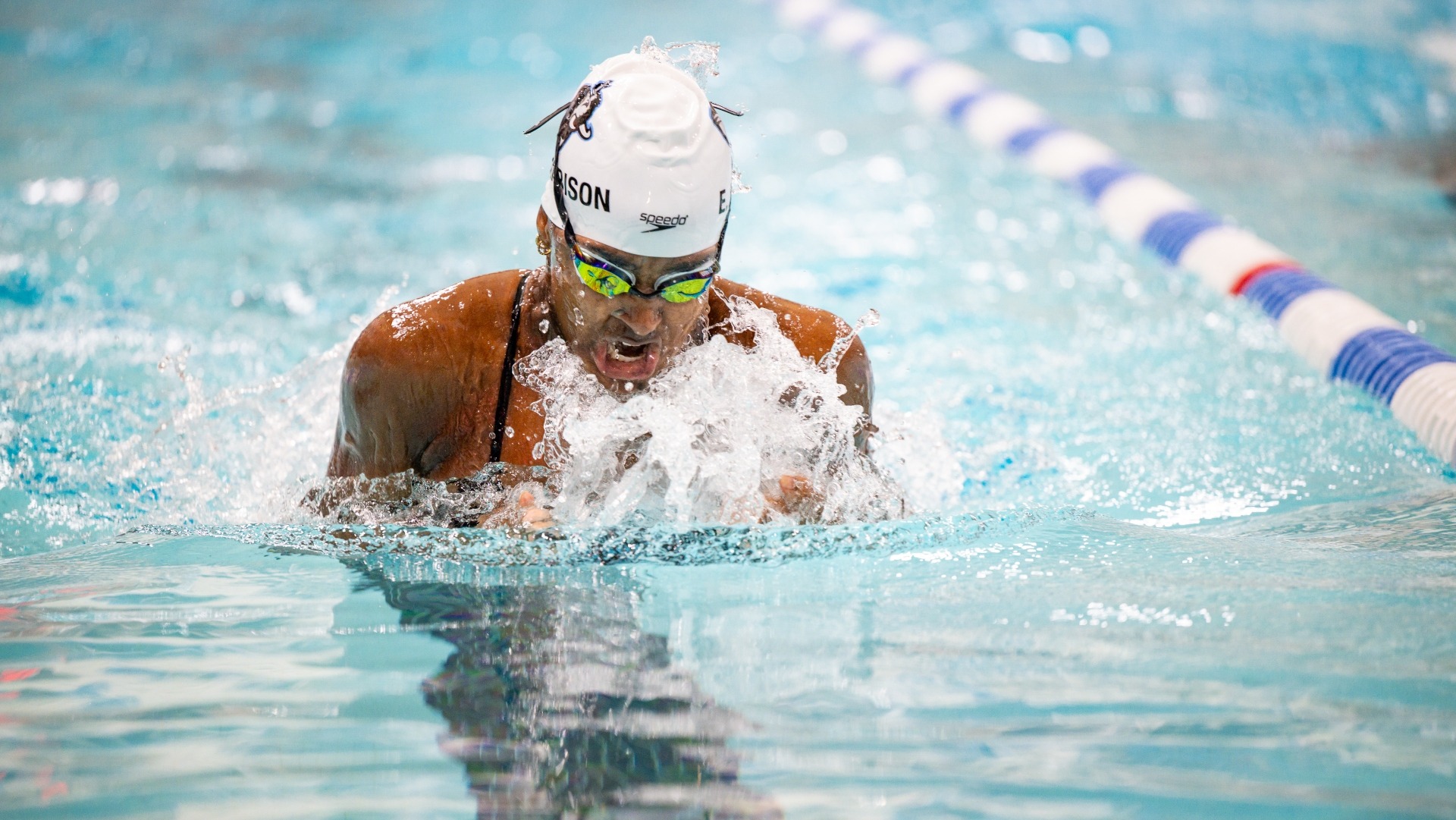 Elena Harrison competes in the individual medley against Brandeis.