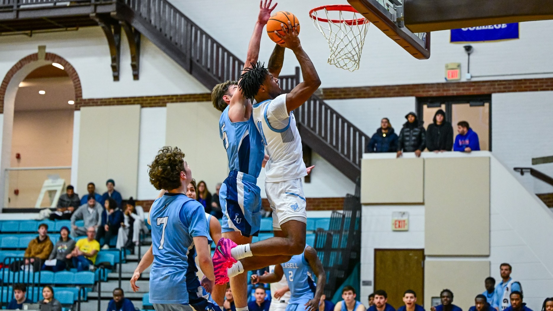 Jon Medley Finishes at the rim against Lasell University Saturday, December 6.