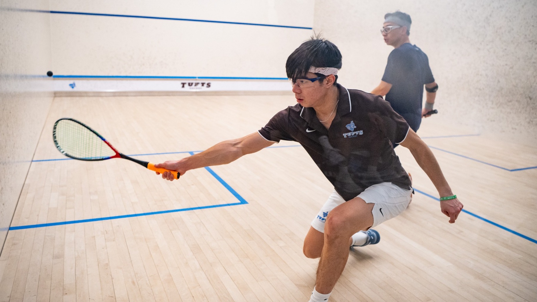 Jared Chin Hits Shot against Conn. College Saturday.