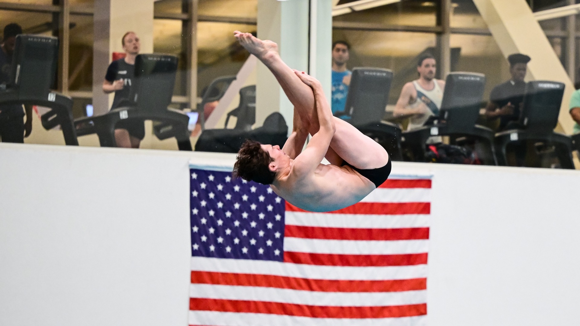 Elias Brandt competes in the diving events at MIT.
