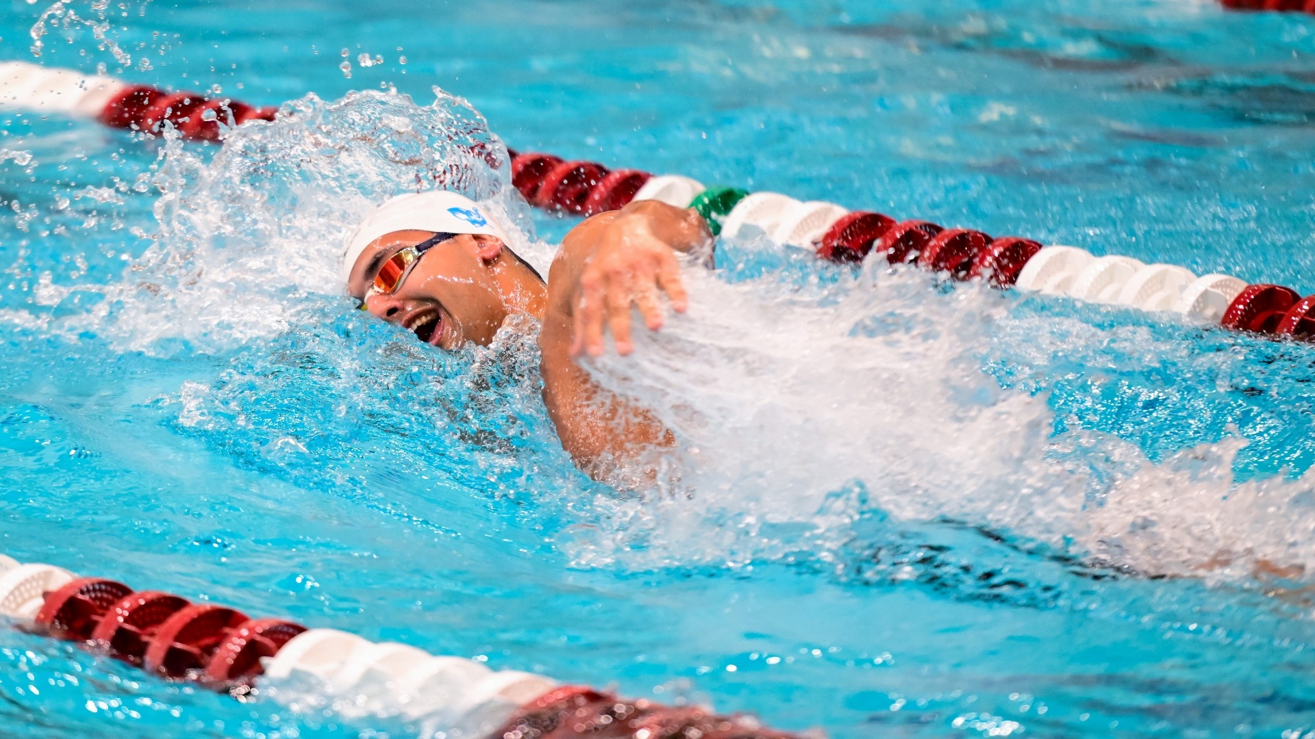Armaan Sikka swims the freestyle in a meet against MIT.