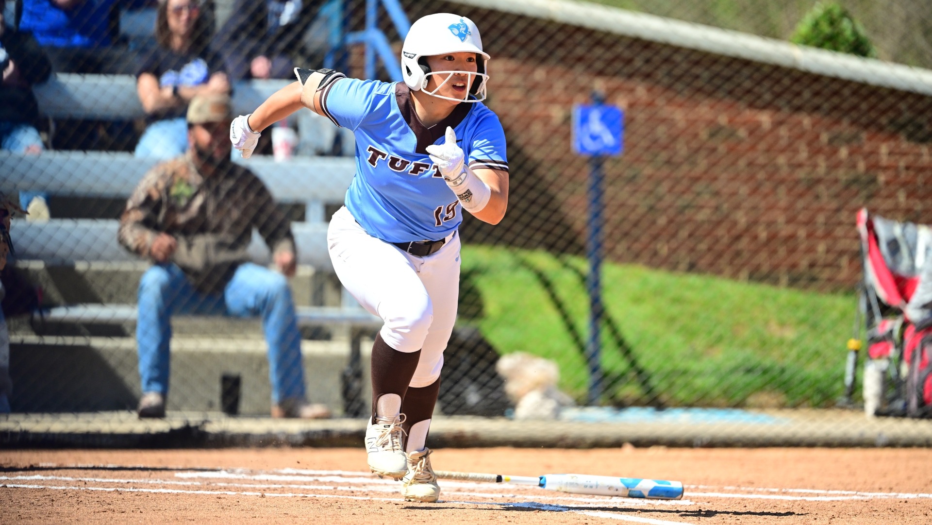 Lauryn Horita watches the flight of her hit in a game at Christopher Newport University.