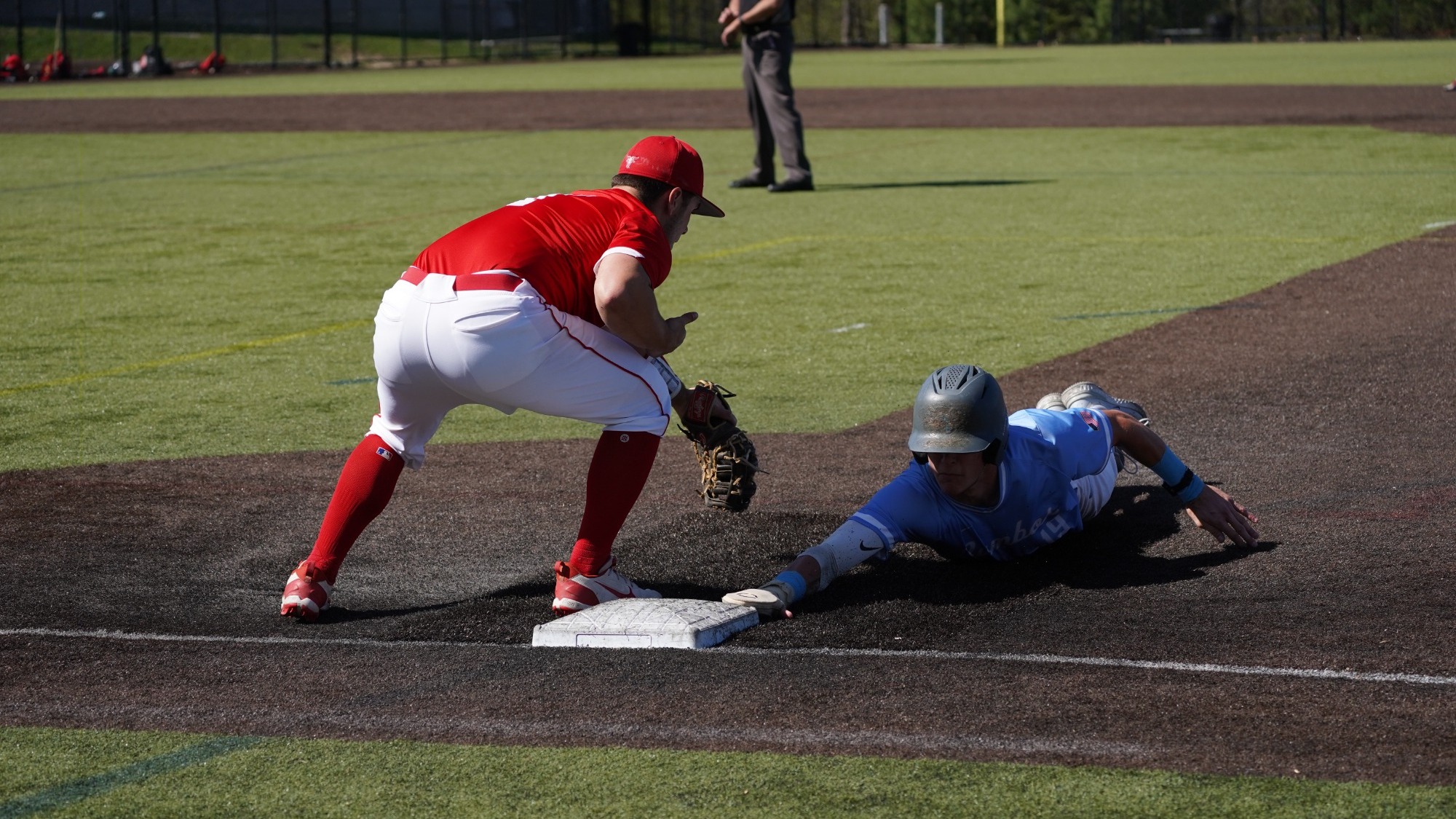 James Henshon dives back to first vs WPI