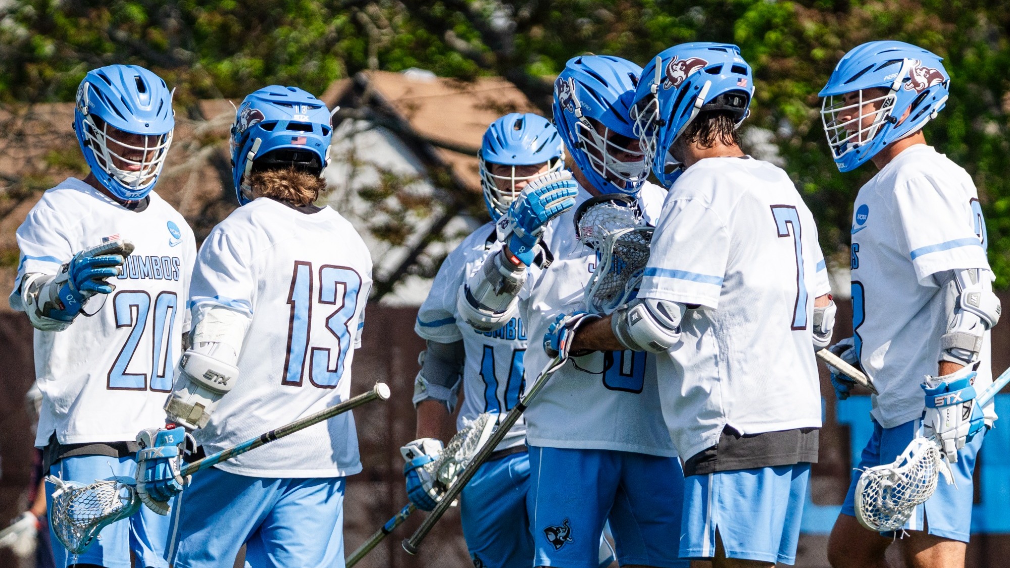 Tufts Huddles After Goal against Gettysburg