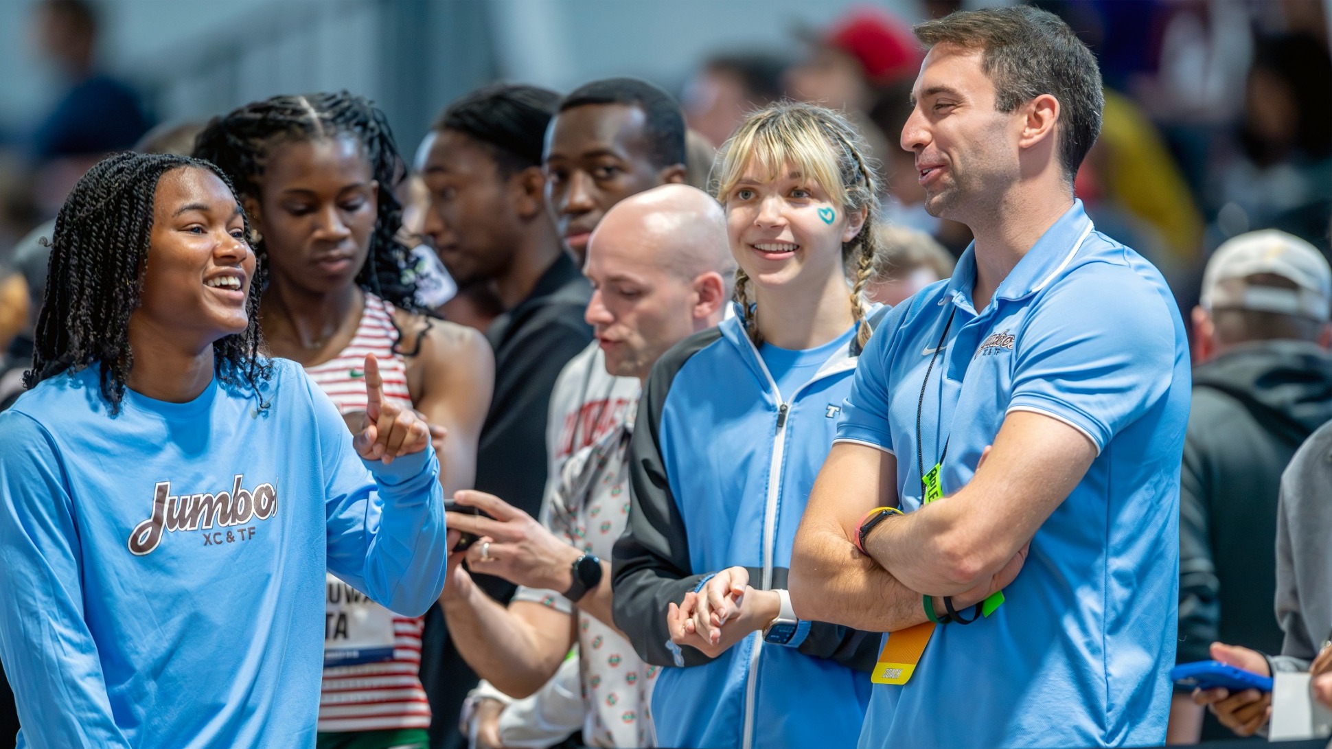 Ben Colello and Elysse Cumberland celebrate the Indoor Triple Jump National Championship Win
