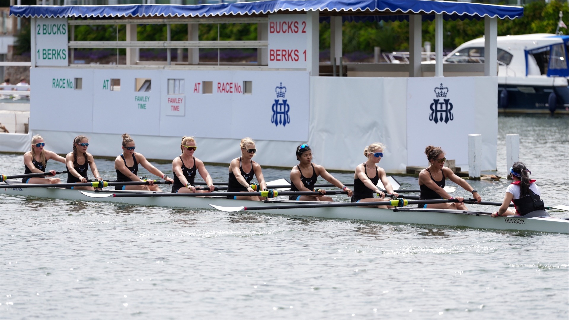 The women's rowing 1st varsity eight practices on the River Thames in England.