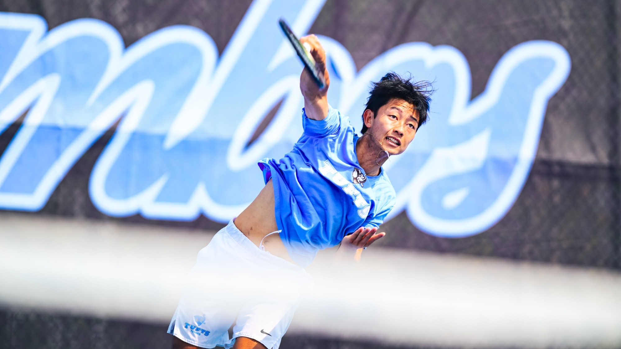 Takehiro Shuda Hits Serve For Tufts Men's Tennis Team