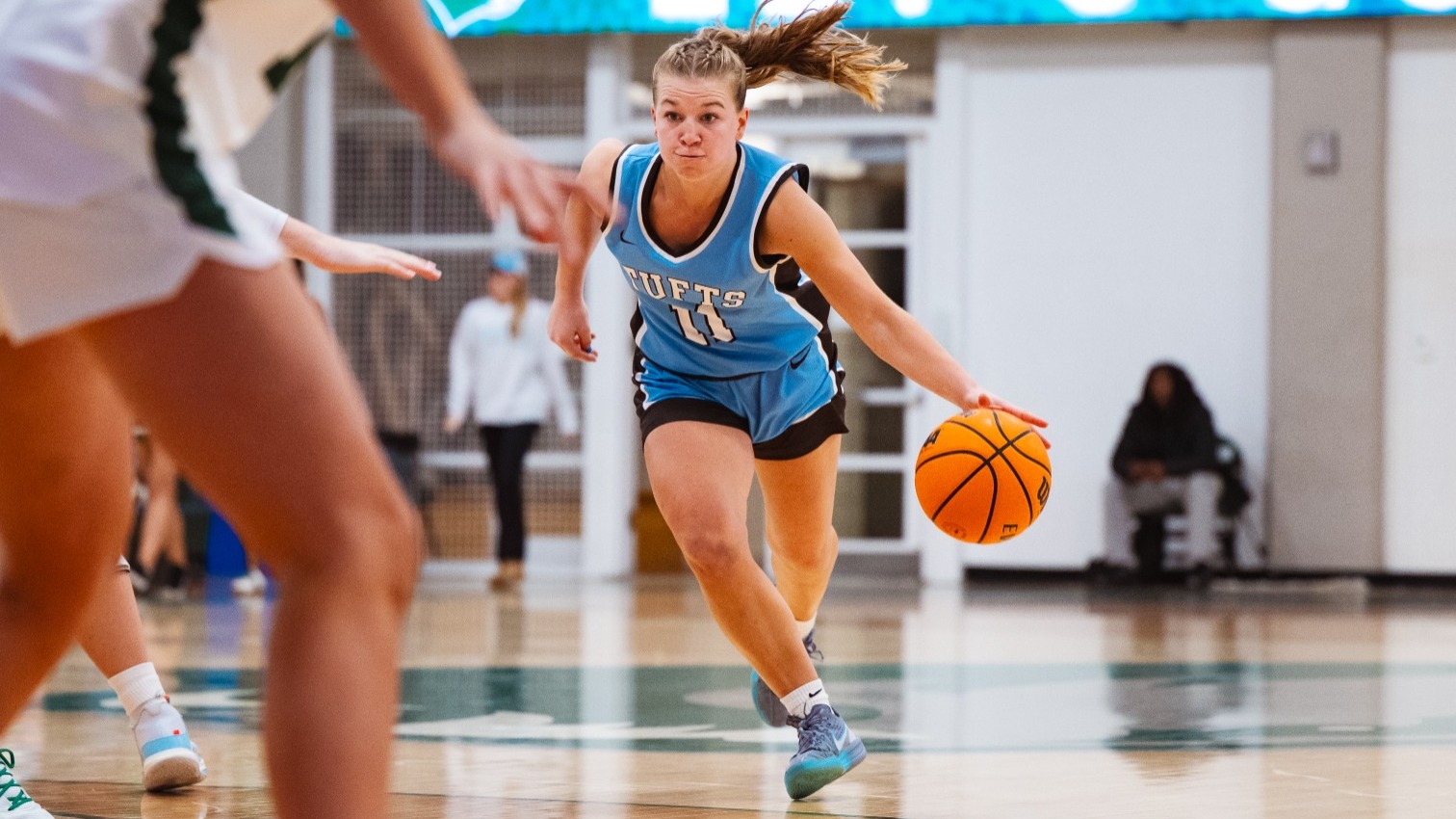 Abby Congdon Drives To The Lane Against Babson College.