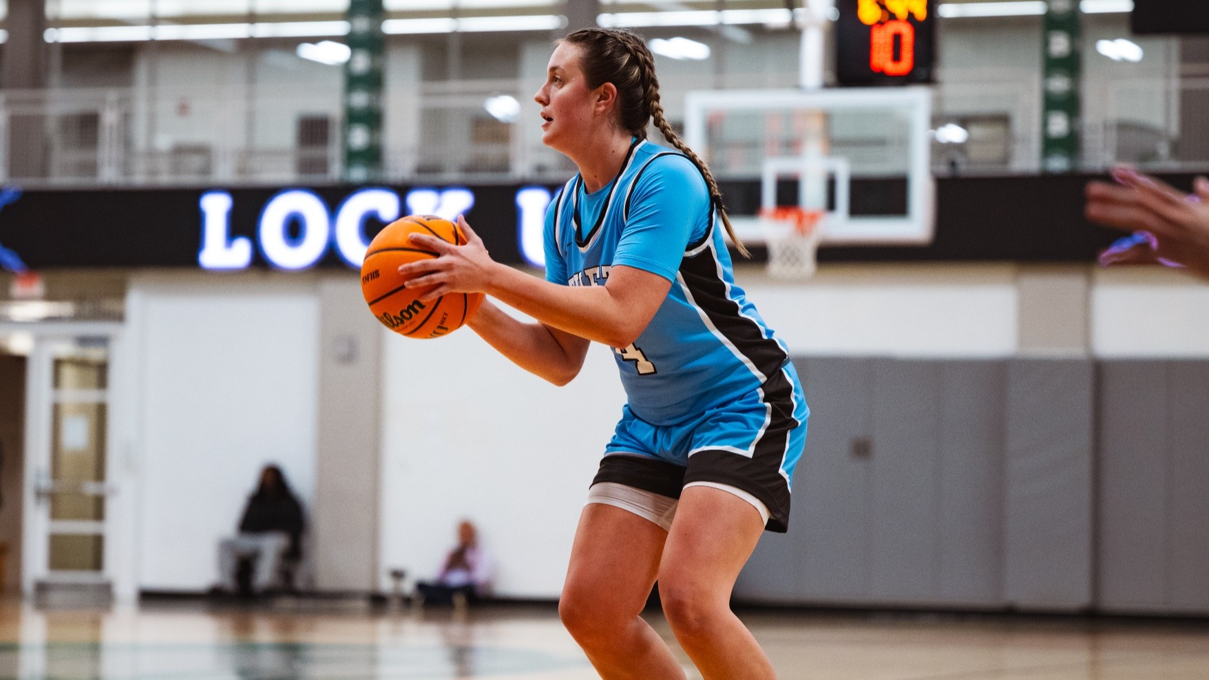 Claire Kolkhorst Shoots Against Babson College.