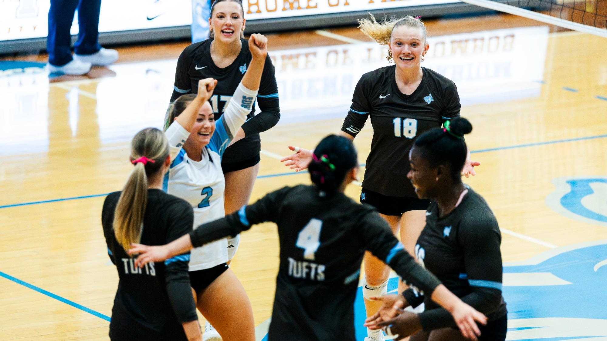 Tufts Women's Volleyball Team Huddle