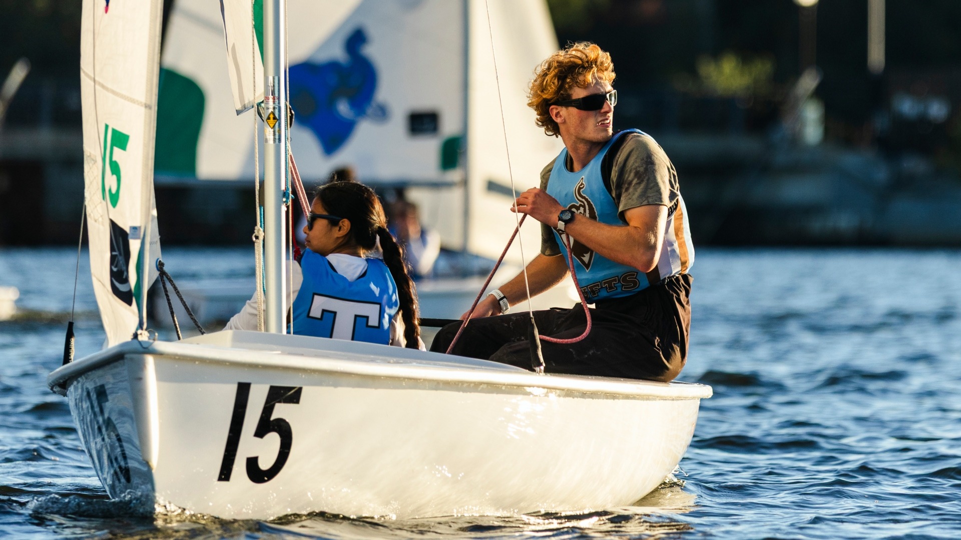 Skipper Devon Owen and crew Eliana Mopper practice on Upper Mystic Lake.