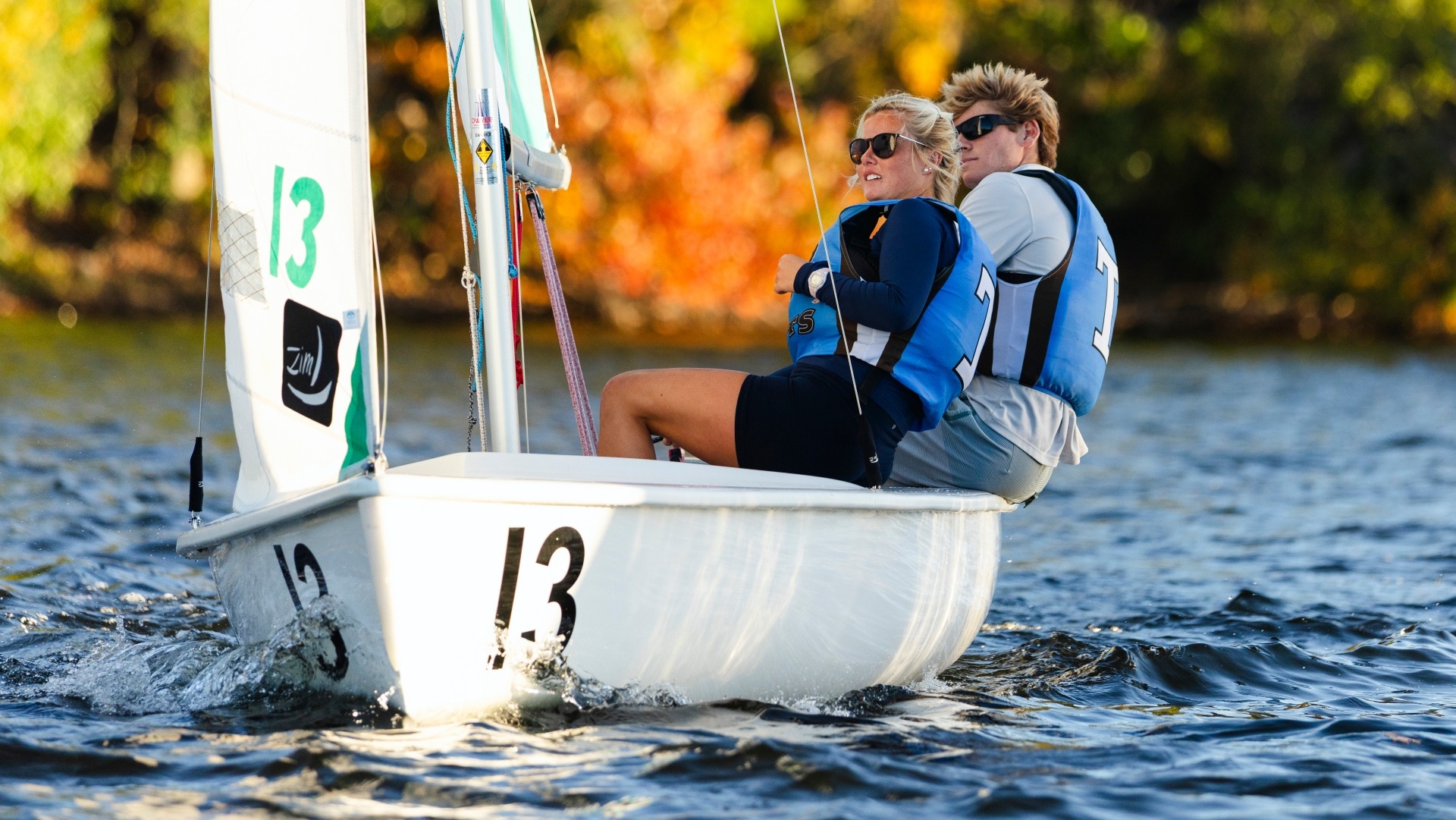 Crue Ziskind and Reddin Kehrli sail at practice on Upper Mystic Lake.