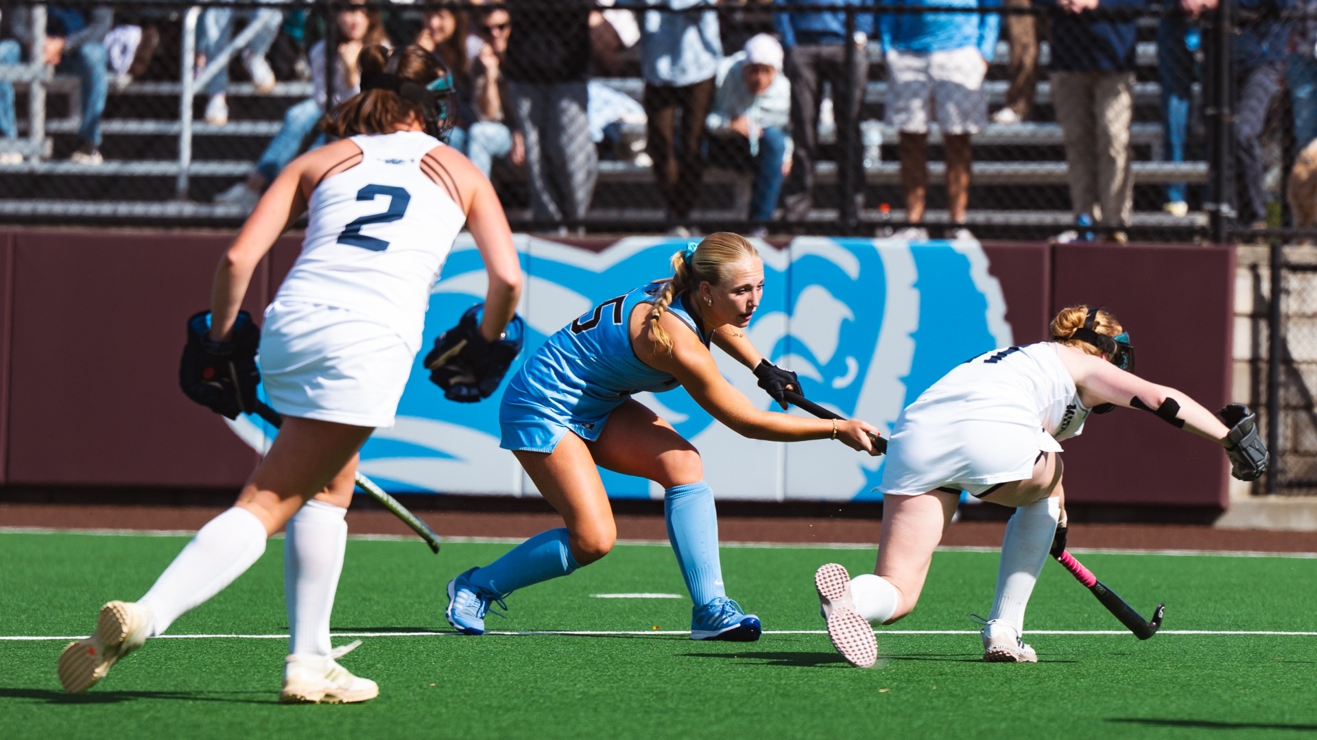 Lufts sends the ball upfield against Middlebury College.