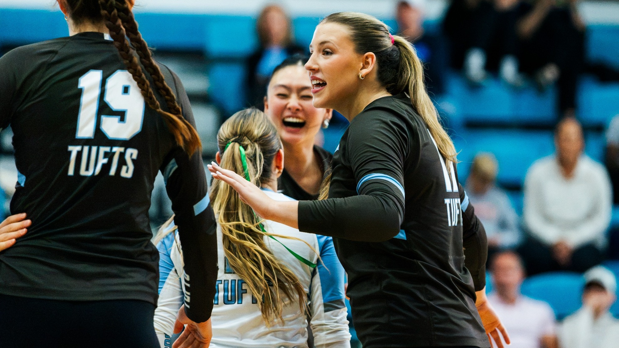 Claire Castor Celebrates Point With Teammates
