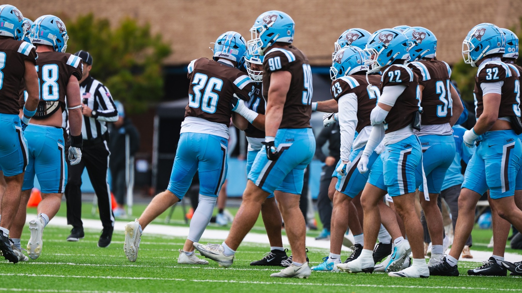 Tufts Defense Running Onto the Field