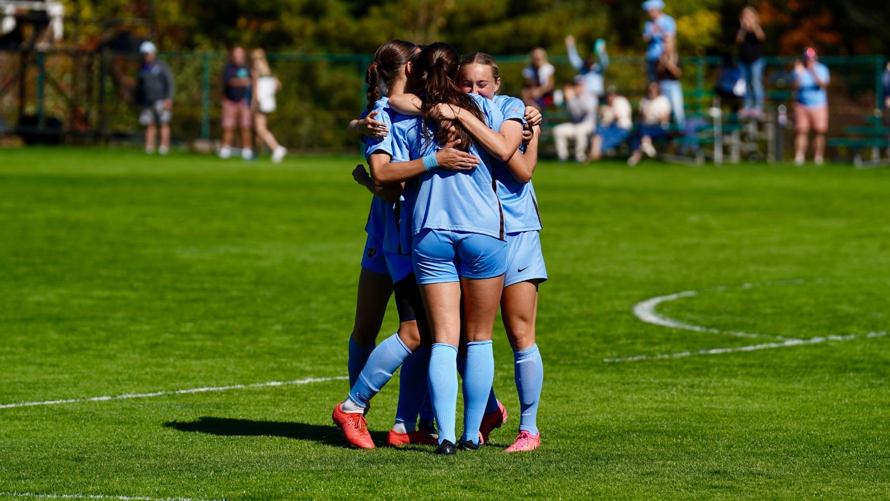Team goal celebration at Amherst
