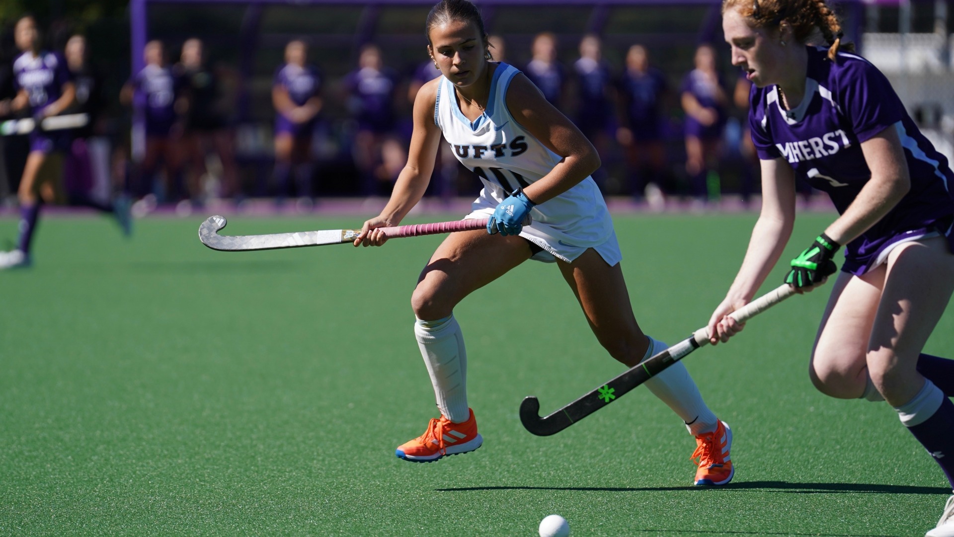 Riley Pearson plays defense in the Tufts game against Amherst.