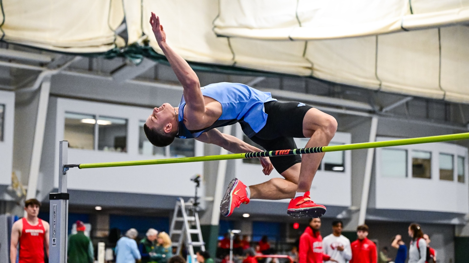Dylan Moreno clears the bar in the high jump at the Gantcher Center.