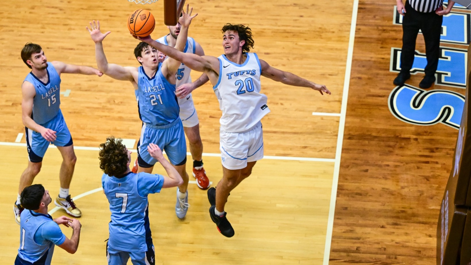 Scott Gyimesi Rebounds Ball Against Lasell University.