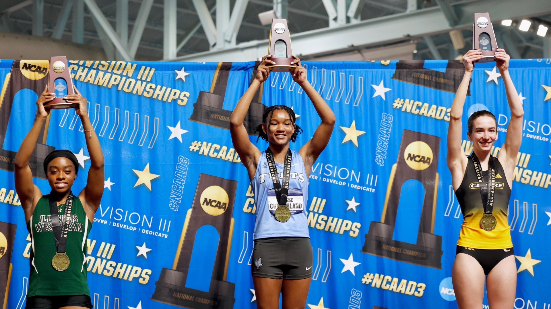 Elysse Cumberland with the triple jump national championship award.