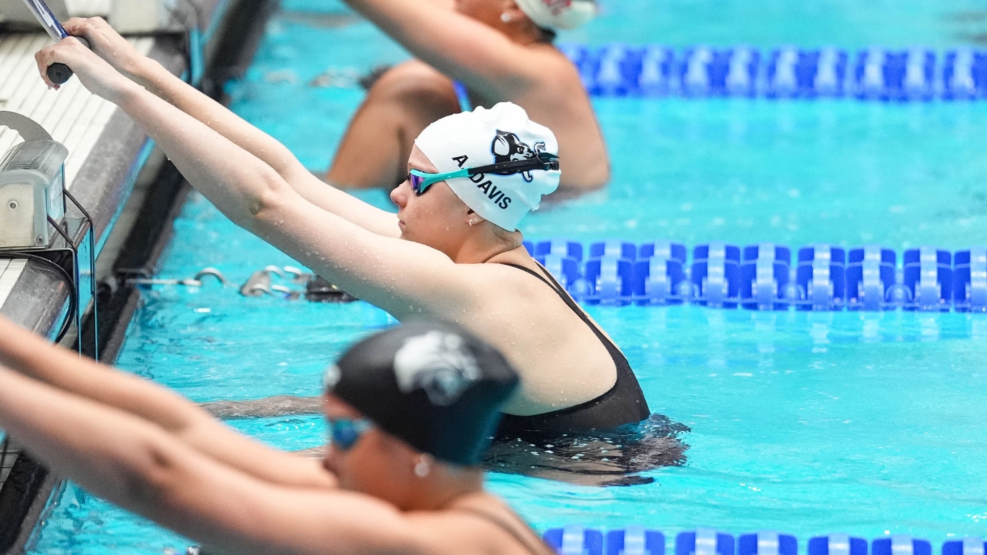 Abby Davis prepares to start the 100 backstroke at the NCAA meet.