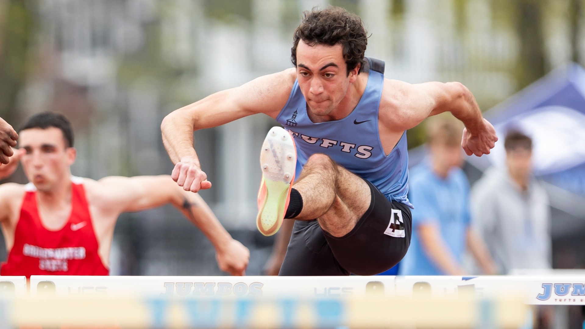 Cam McLeod runs in the hurdles at Ellis Oval during the 2025 outdoor season.