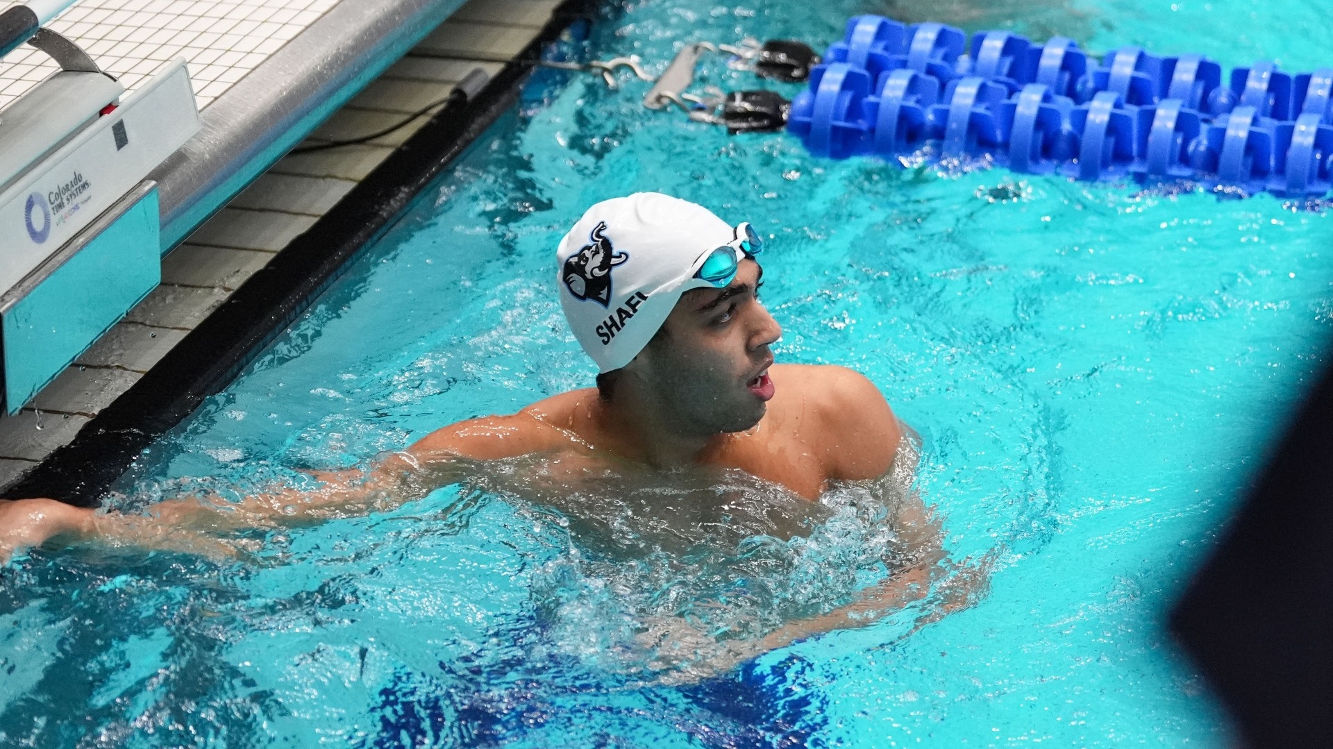 Rafae Shafi at the of a race at the NCAA Championship meet.