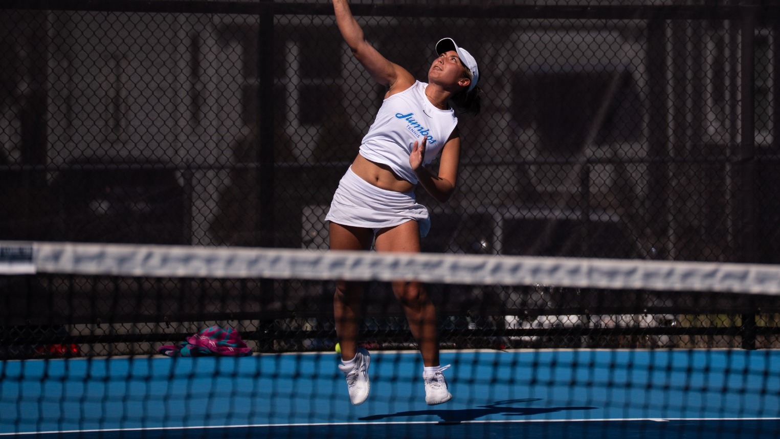 Ellie Gershaw Hits Serve Against Amherst March 29.