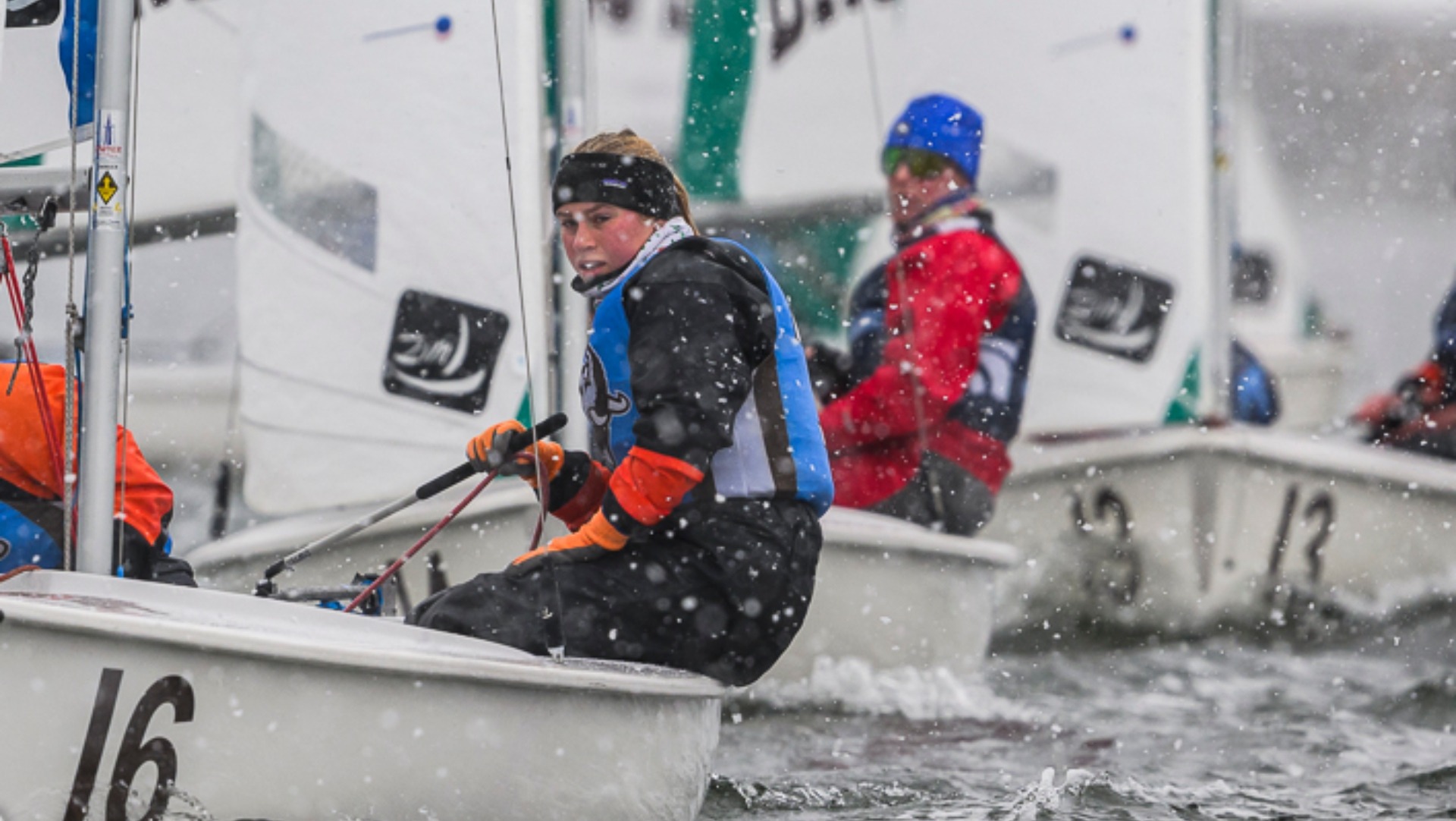 Skipper Sophia Hubbard battles the elements in an early spring season regatta.