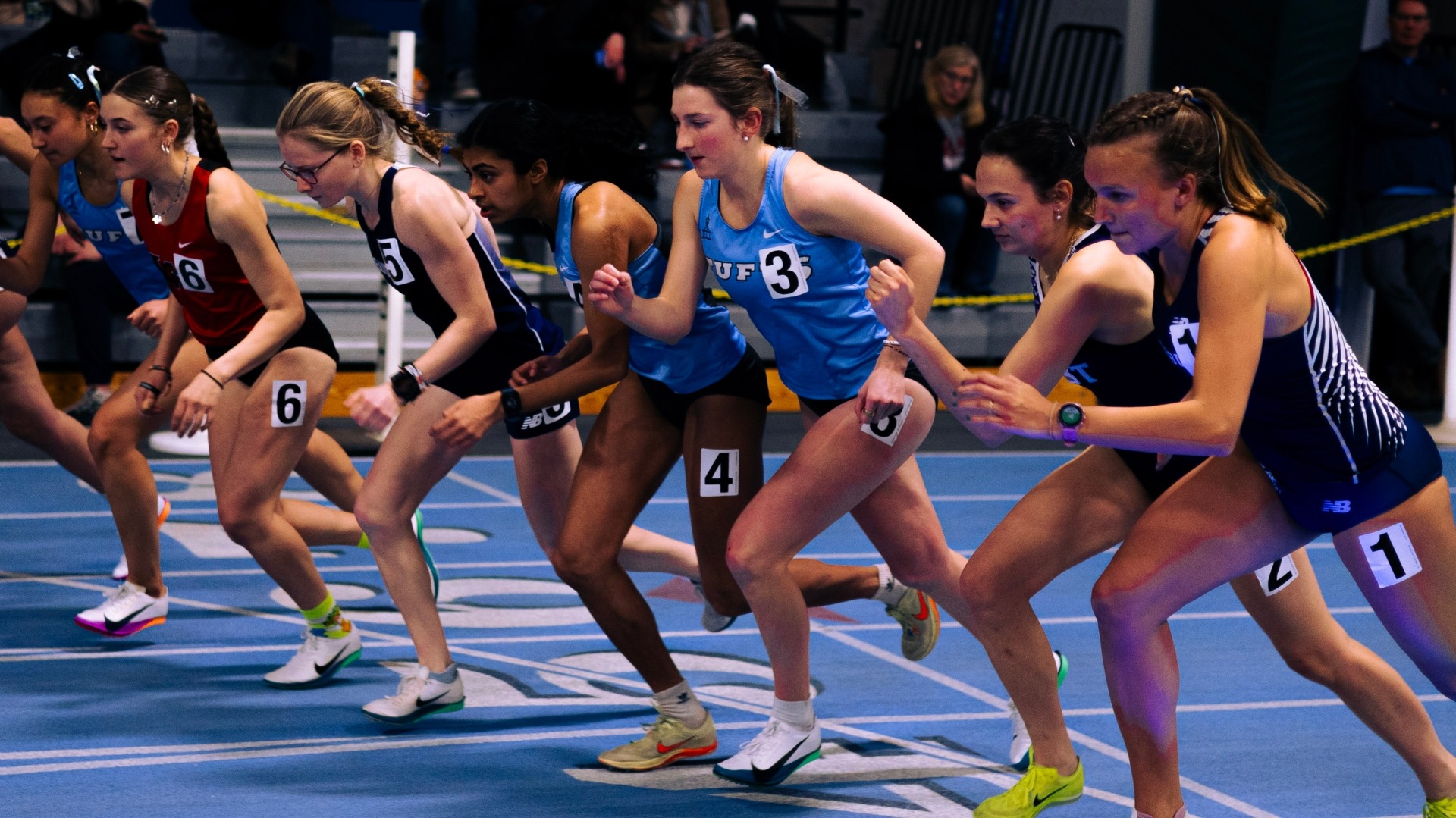 Tufts' Liz Donahue starts a long distance race at the Gantcher Center.