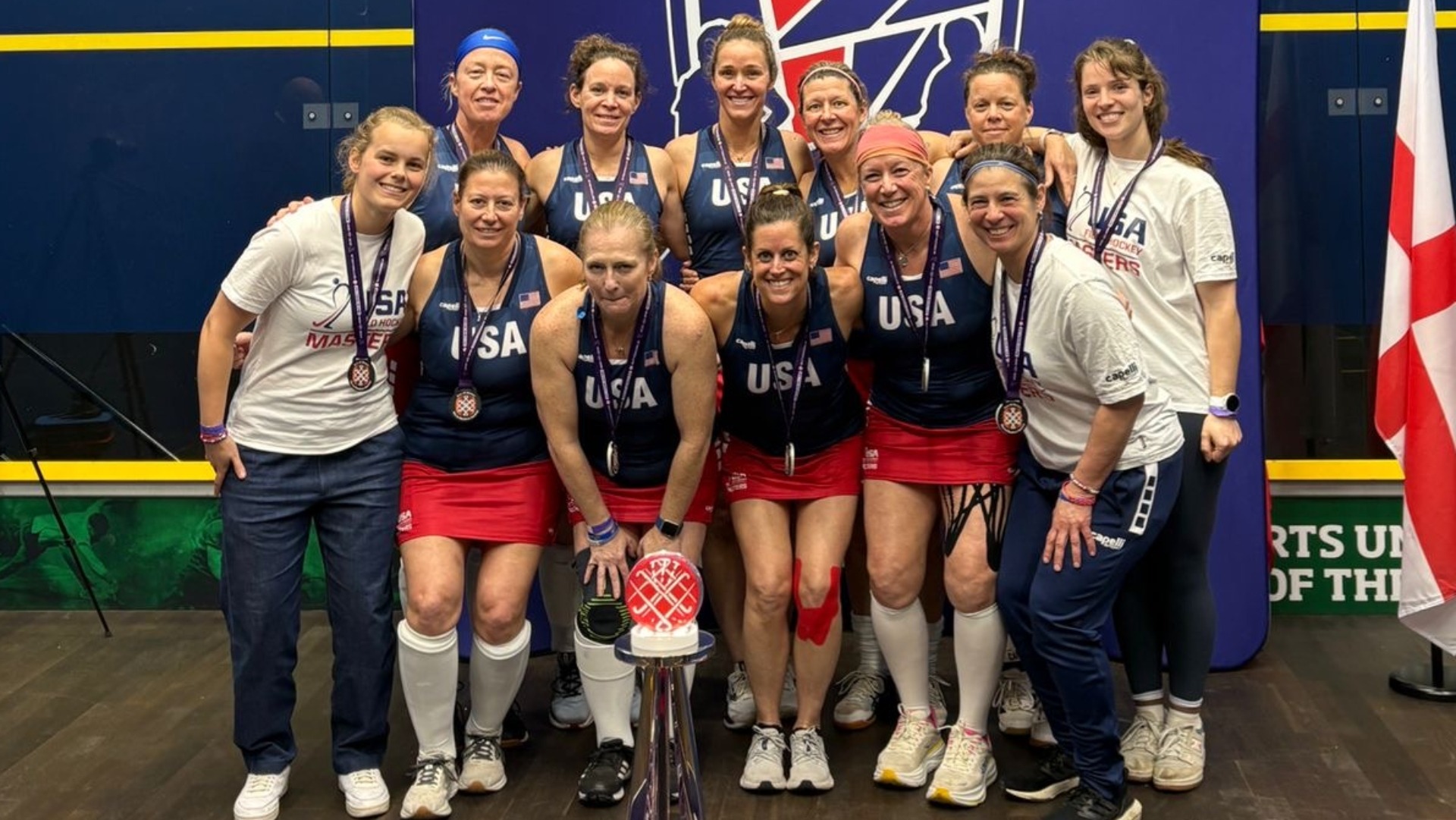 Coach Tina Mattera with the US Indoor Team that won bronze at the Masters Indoor World Cup.