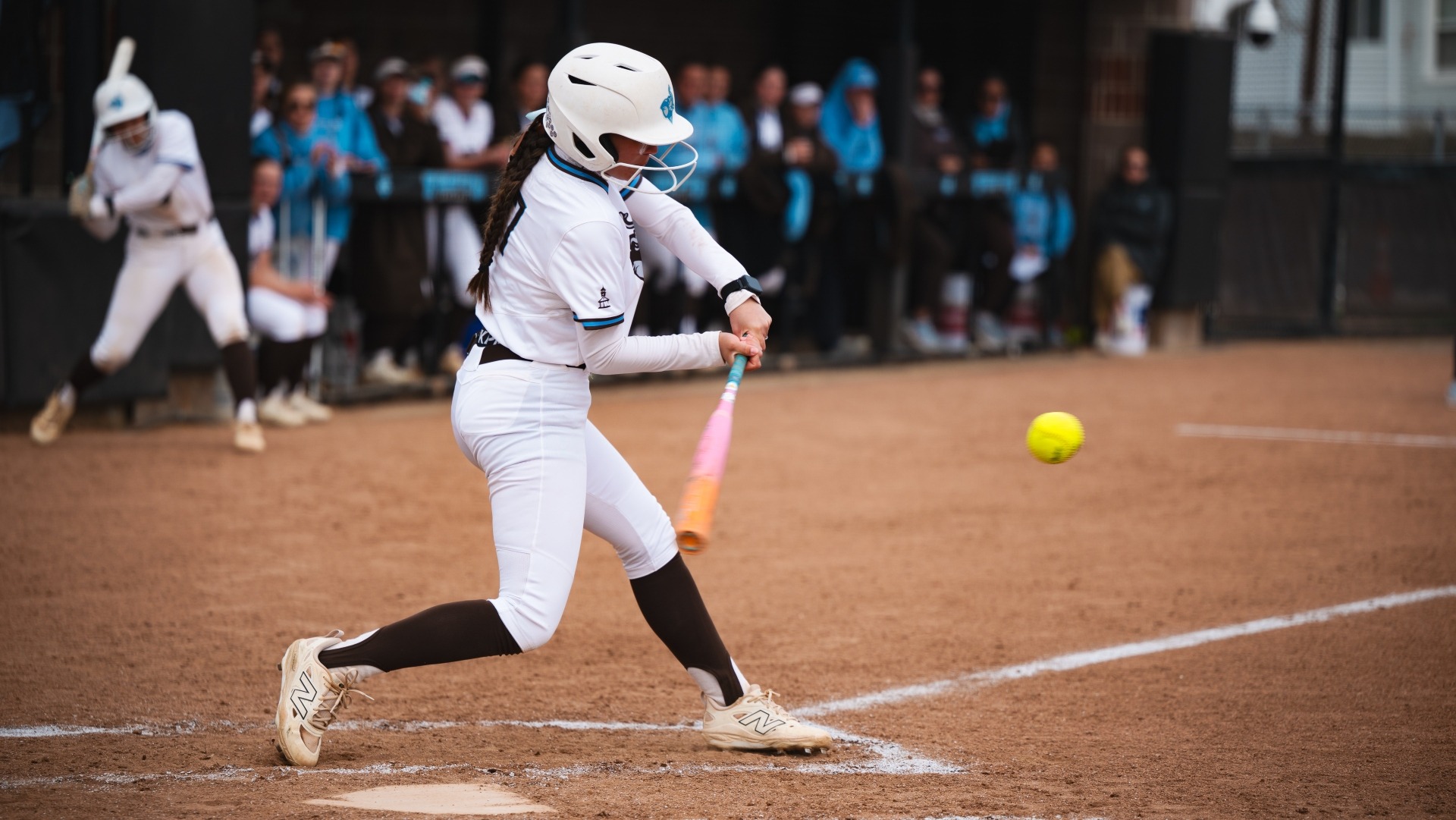 Cat Kawabe has her eye on the ball in a Tufts game against Trinity College.