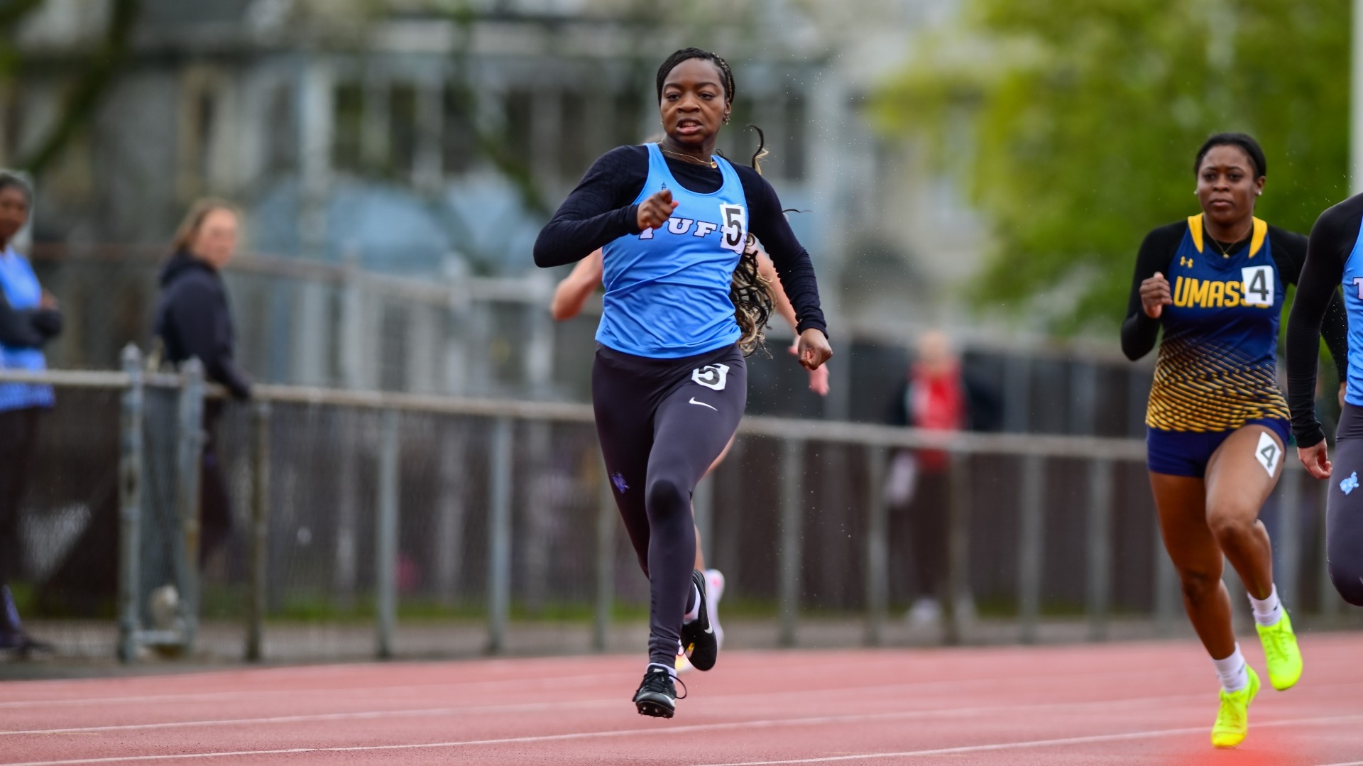 Simi Lawal sprints to the finish line during a 2024 race at Ellis Oval.