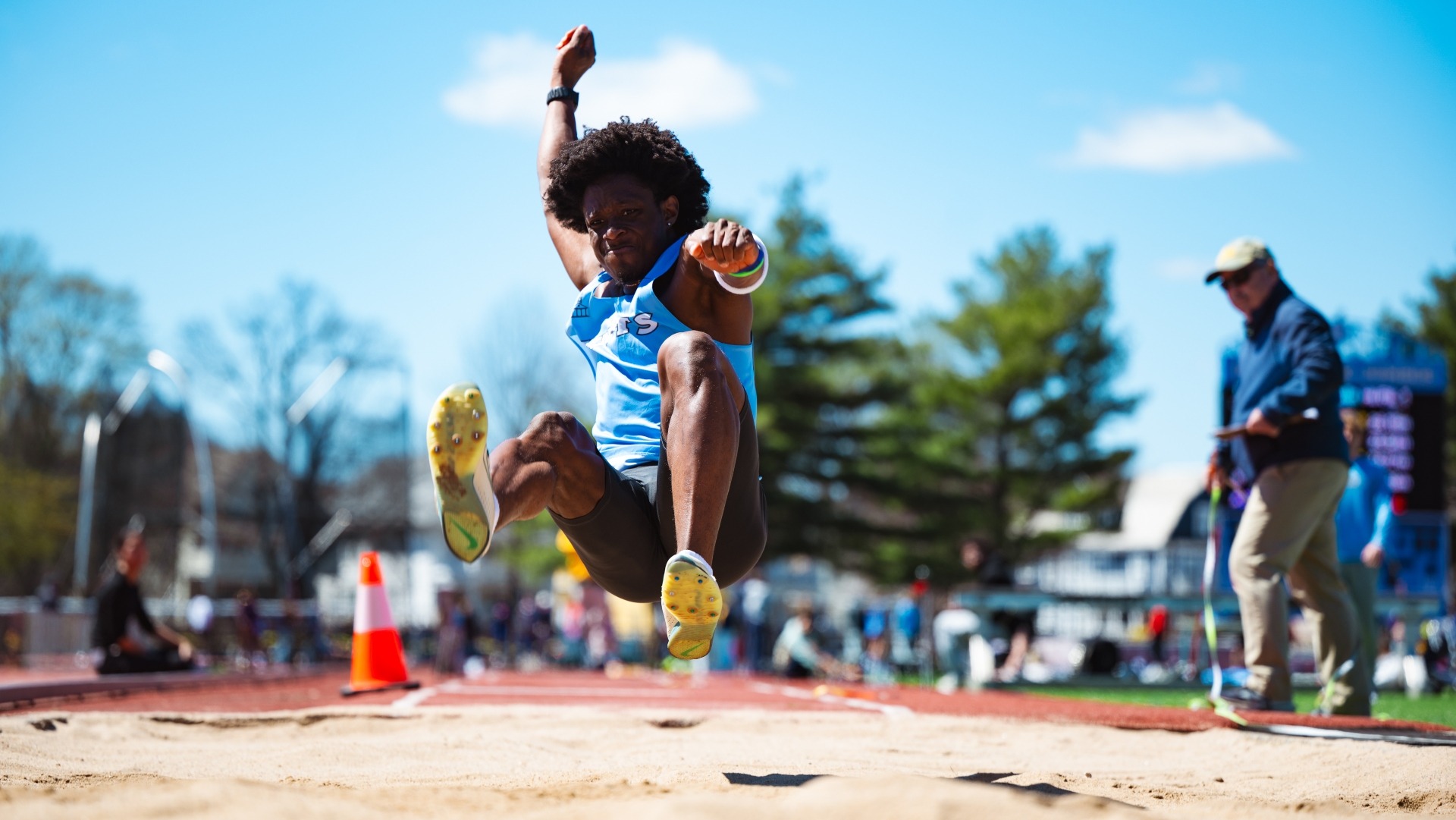 Sahr Matturi prepares to land during one of his jumps at the Tufts Spring Invitational.
