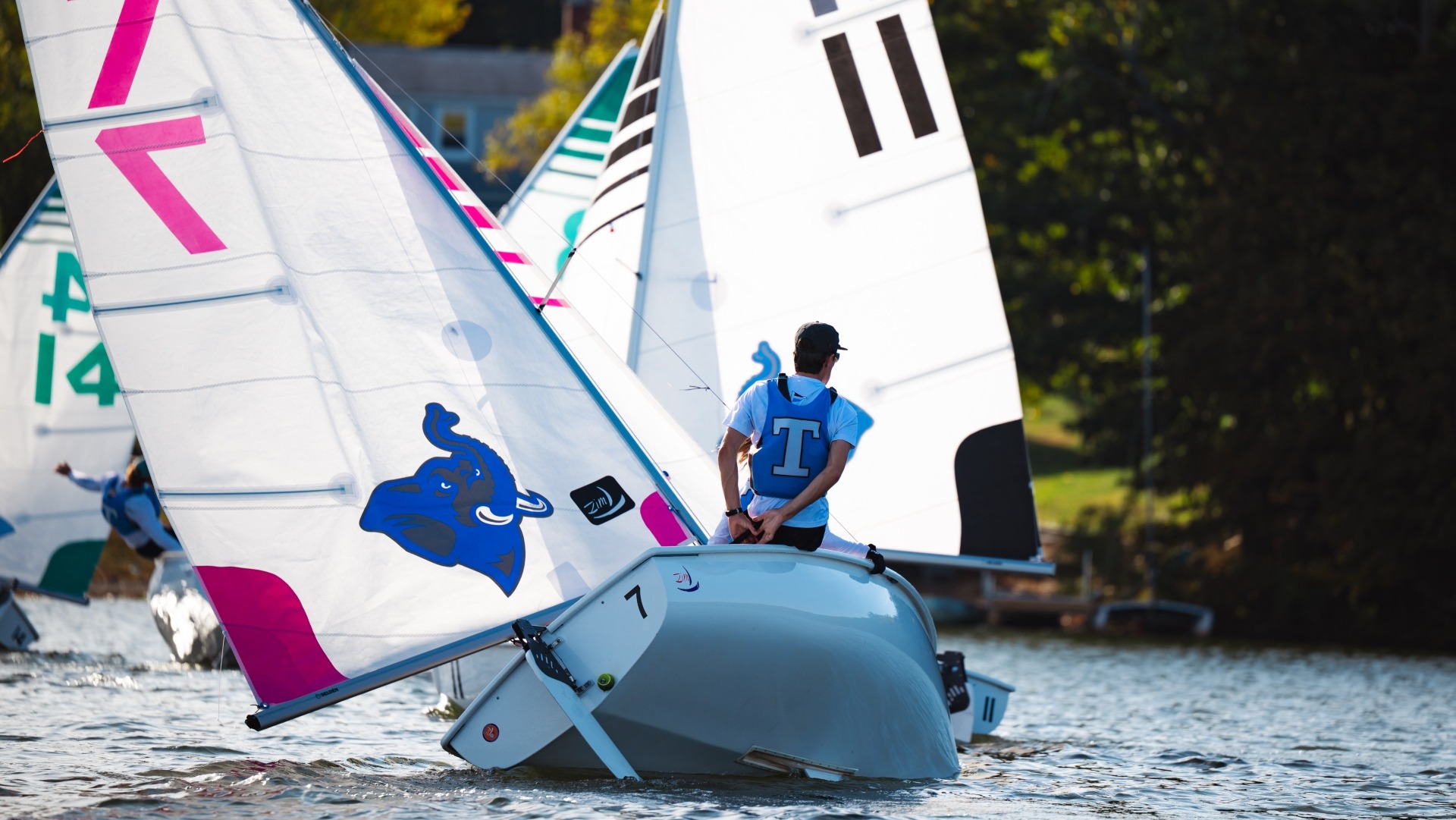 Courtland Doyle sails on Upper Mystic Lake at Tufts practice.
