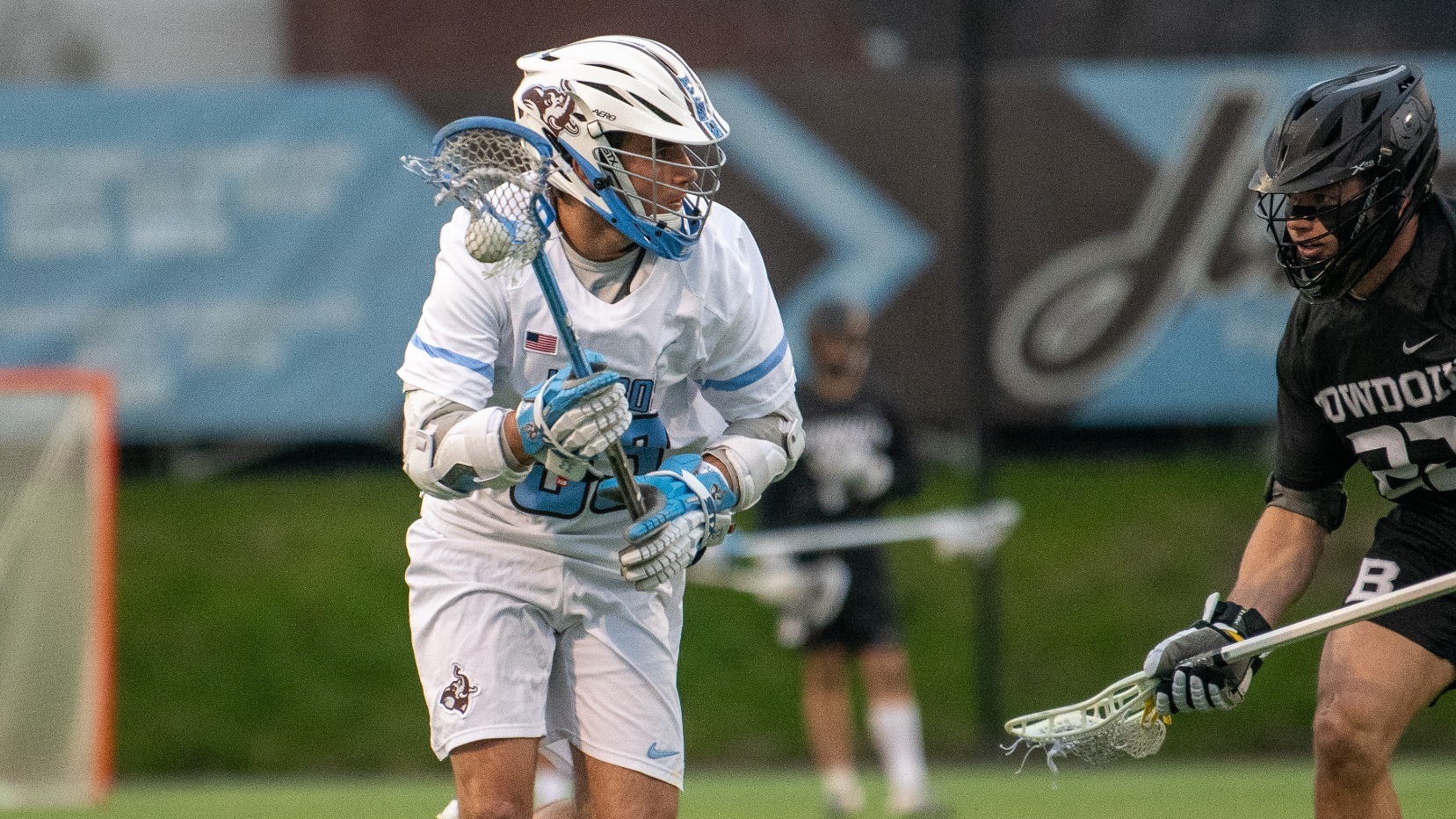 Tufts Lacrosse Player Handles Ball Against Bowdoin College April 22.