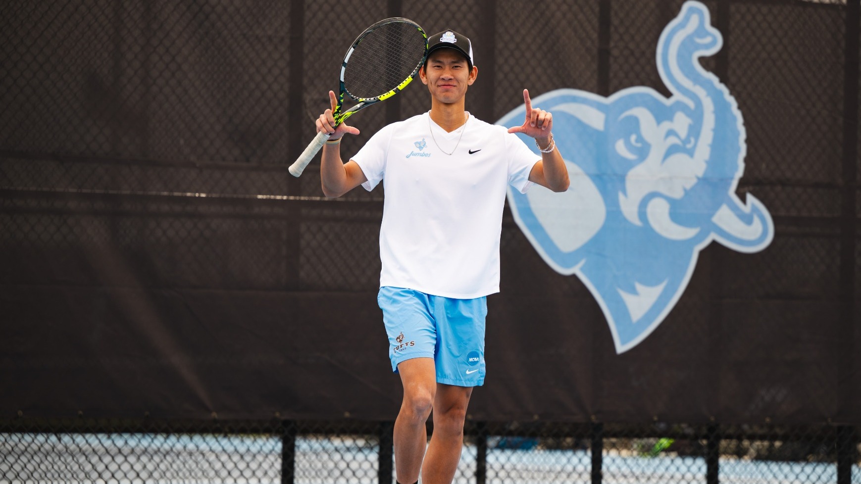 Eren Cheung Celebrates Point Against Trinity College Saturday, April 25