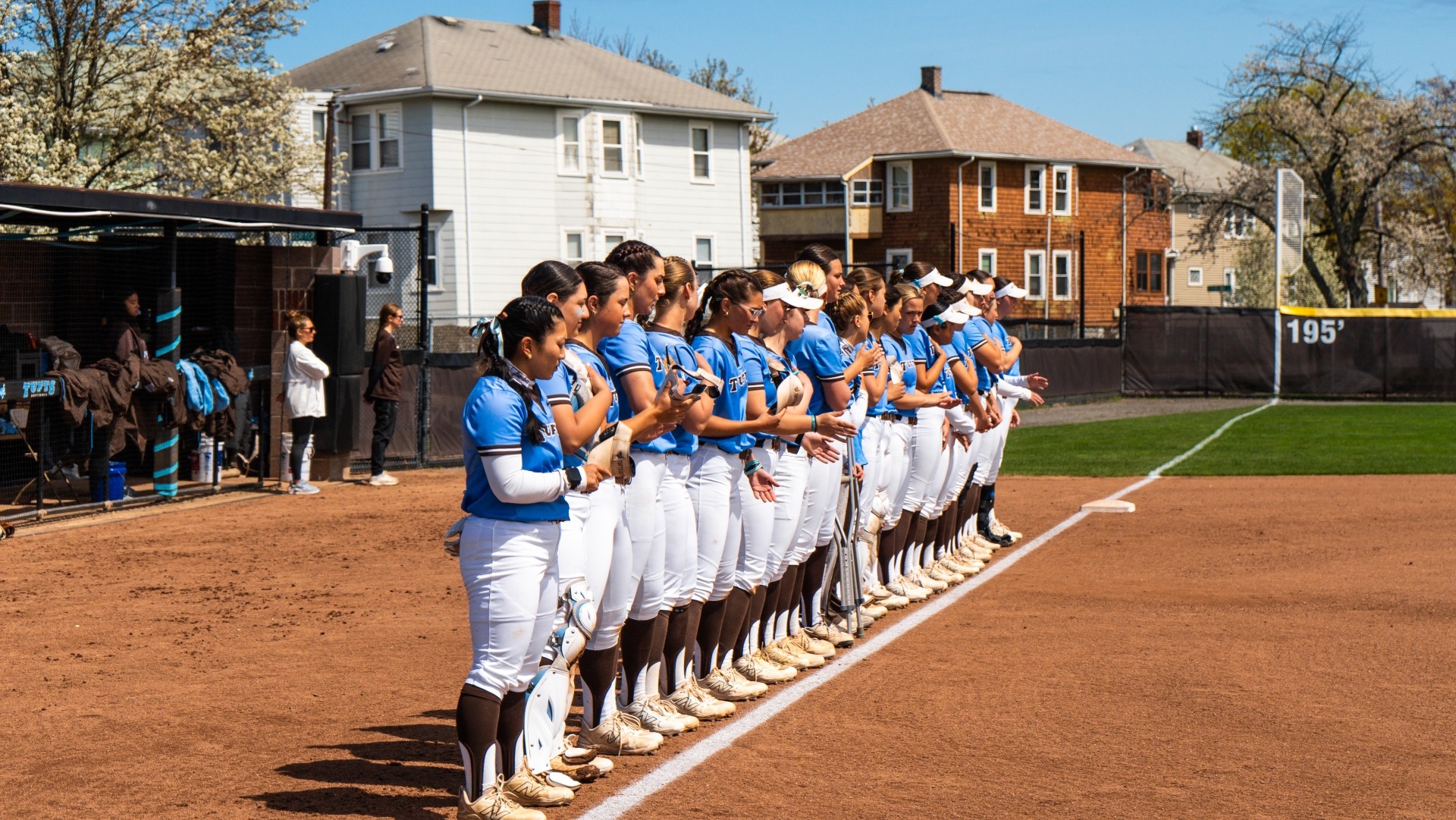 The Tufts team lines up for the national anthem at a recent game.