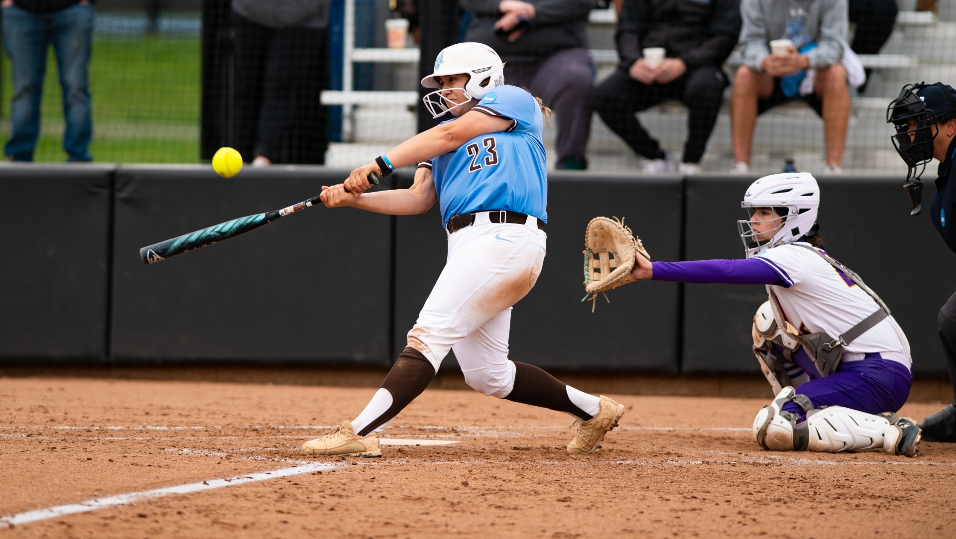 Heaven Oliva connects on a double to set up Tufts' win against Alfred.