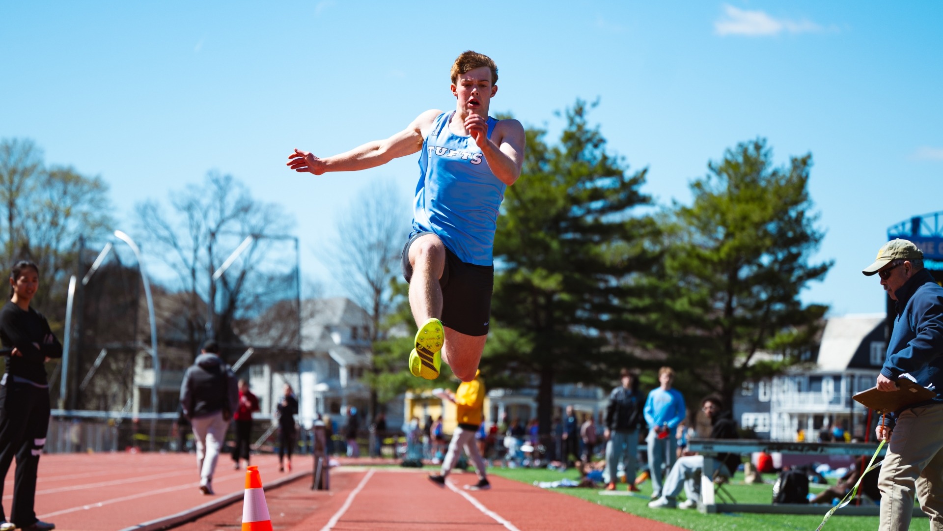 Luke Benson in the middle of one of his jumps at Ellis Oval.