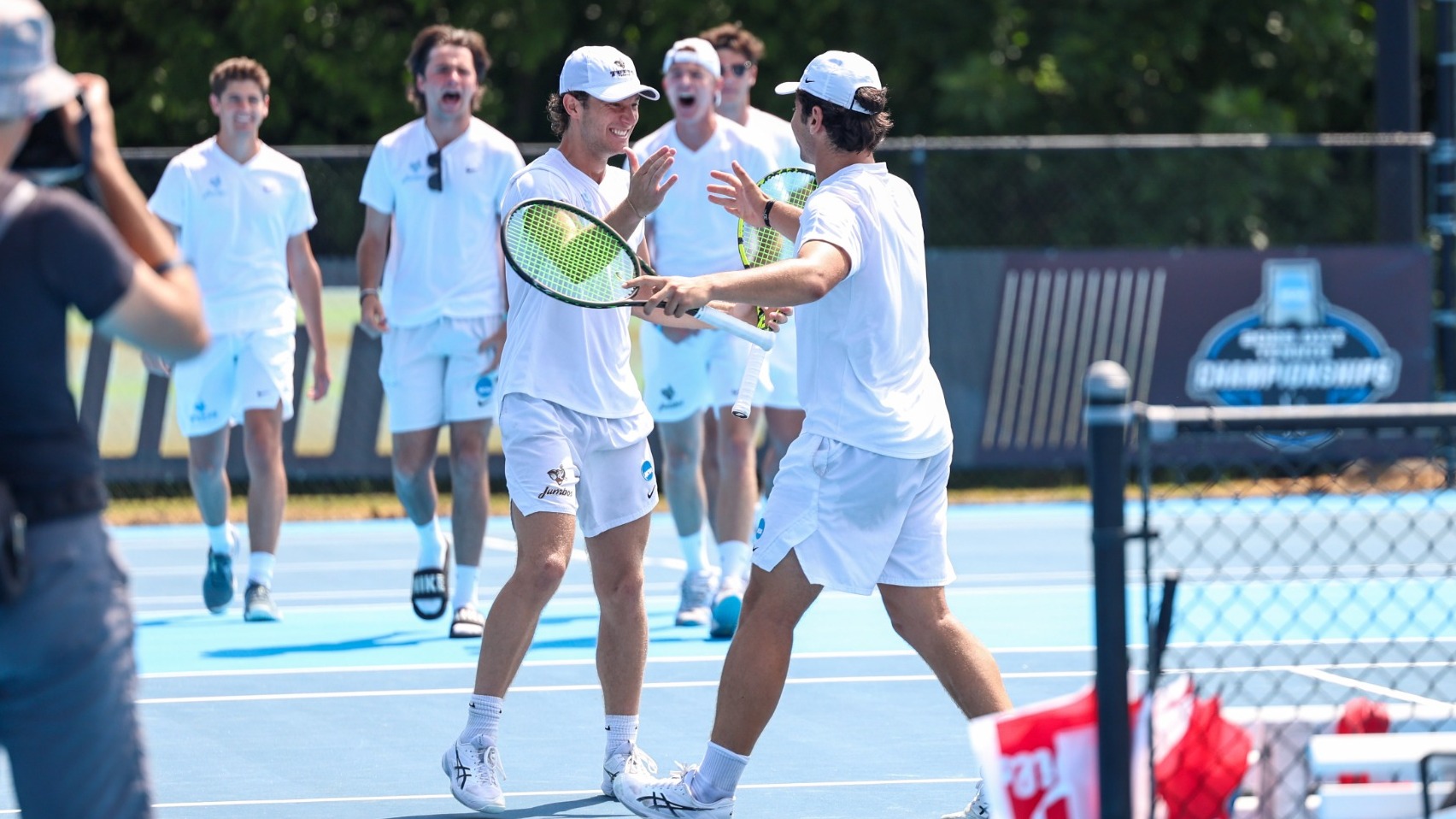 Gonzelez and Mastrogamvrakis Celebrate Point Against Chicago