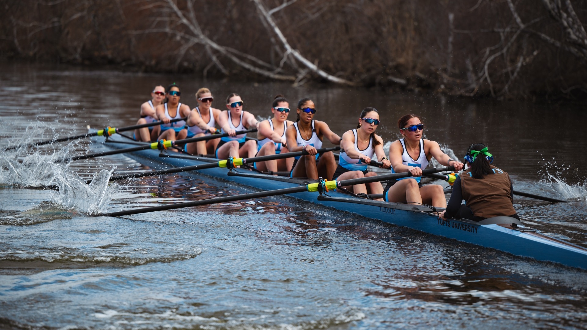 The Tufts women's first varsity races on the first day of the season at Malden River.
