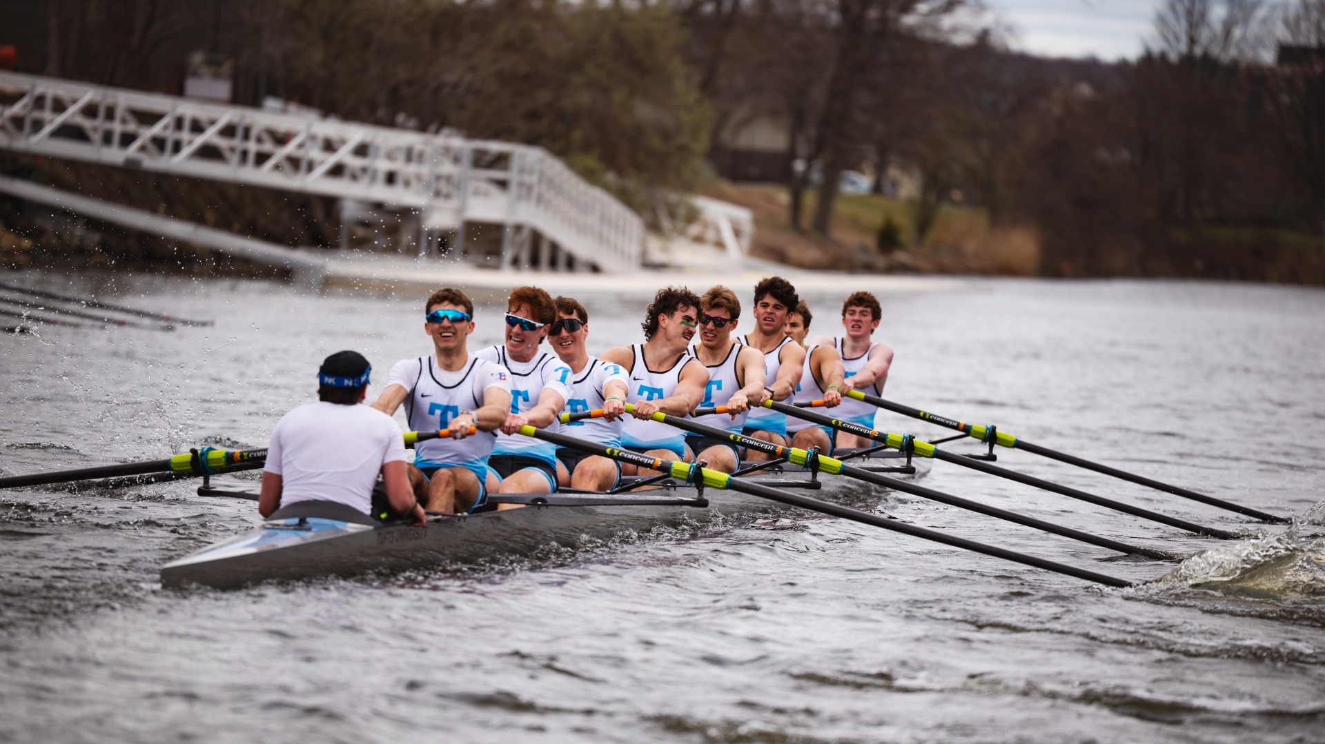 The Tufts men's rowing first varsity competes at Malden River.